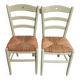Pair of green straw sitting chairs