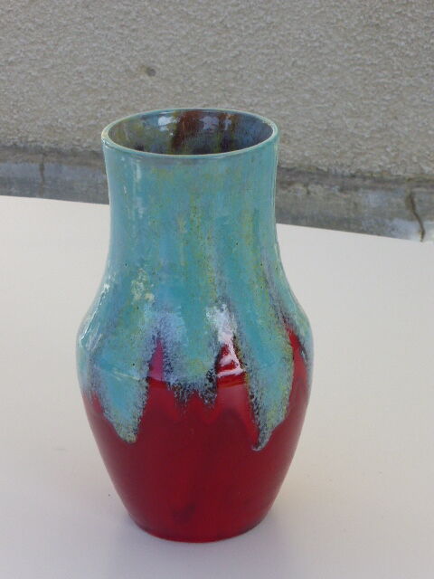 An emailed ceramic vase in turquoise and red, design and vintage