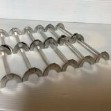 Twelve sola knife holders