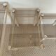Nested tables by Boutboul in cream metal and smoked glass, circa 1970.
