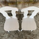 Pair of vintage white wooden bistro chairs