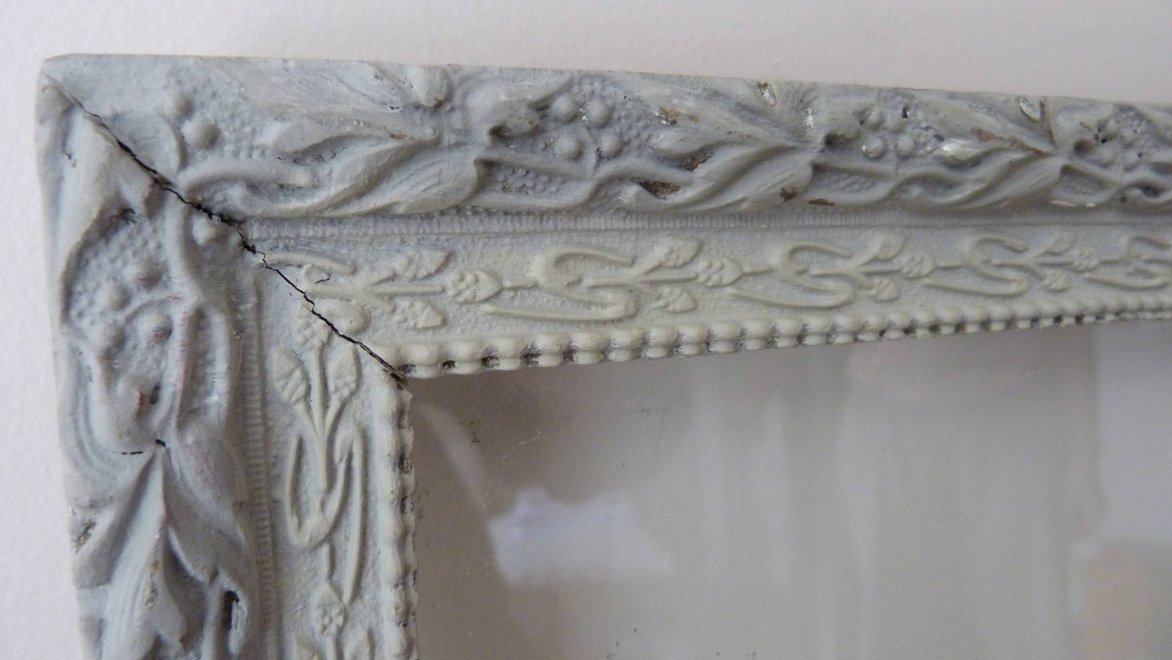 Patinated frame with glass