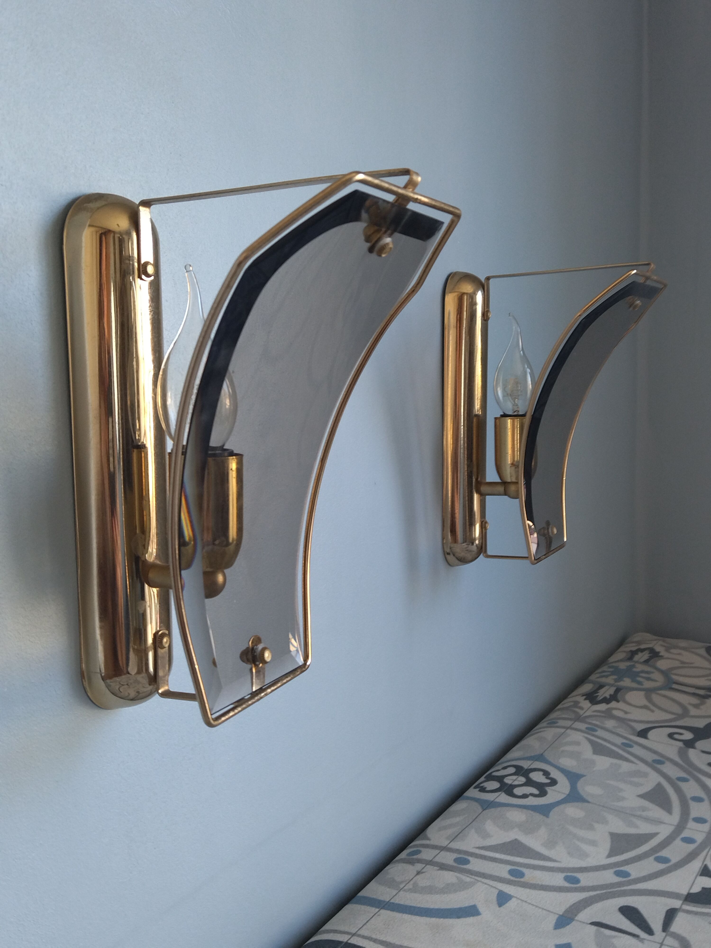 Pair of brass and curved glass wall lamps from the 80s