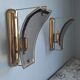 Pair of brass and curved glass wall lamps from the 80s