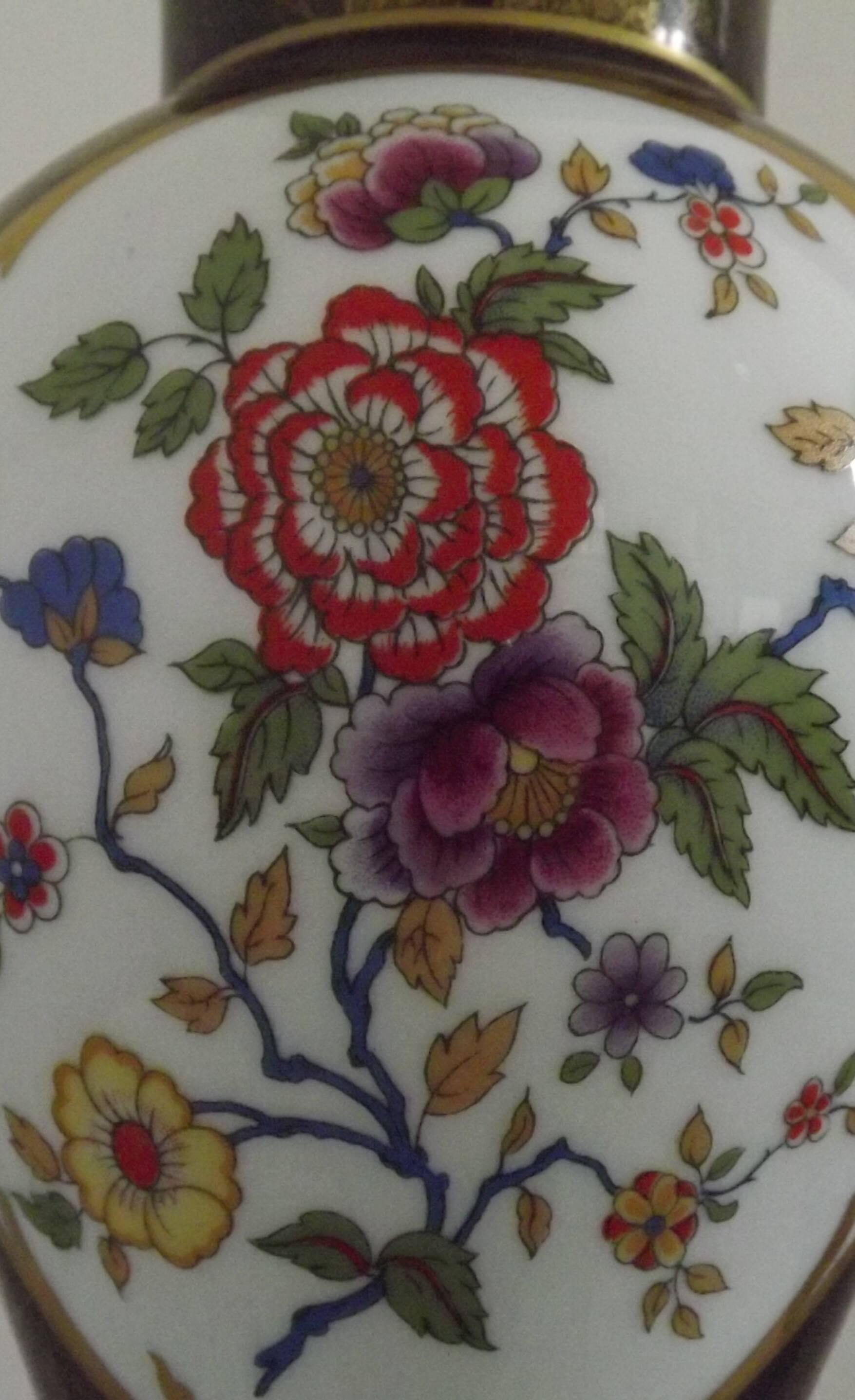 French Limoges Hergé table lamp base with gold highlights and floral decoration.