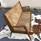 caned teak bench