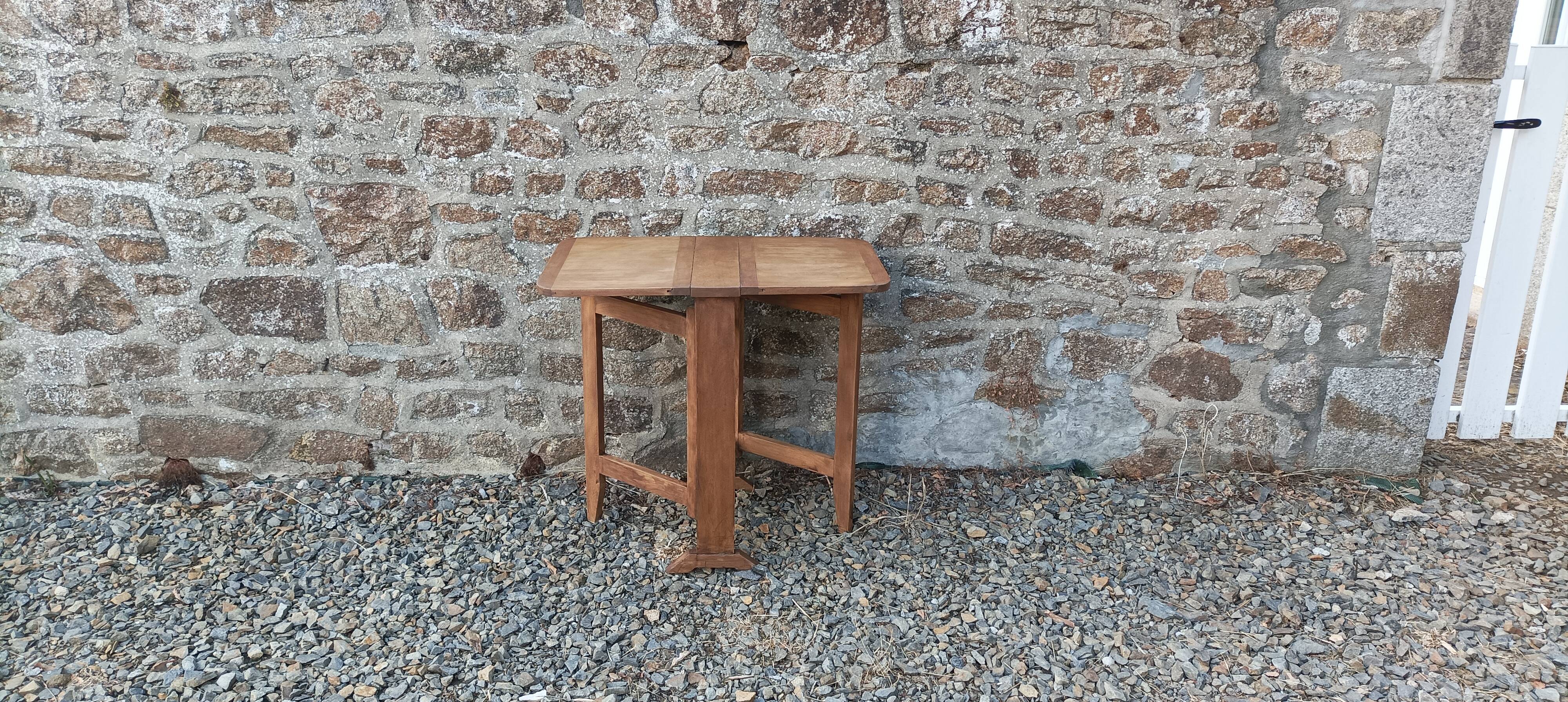 Old wooden table with double swings