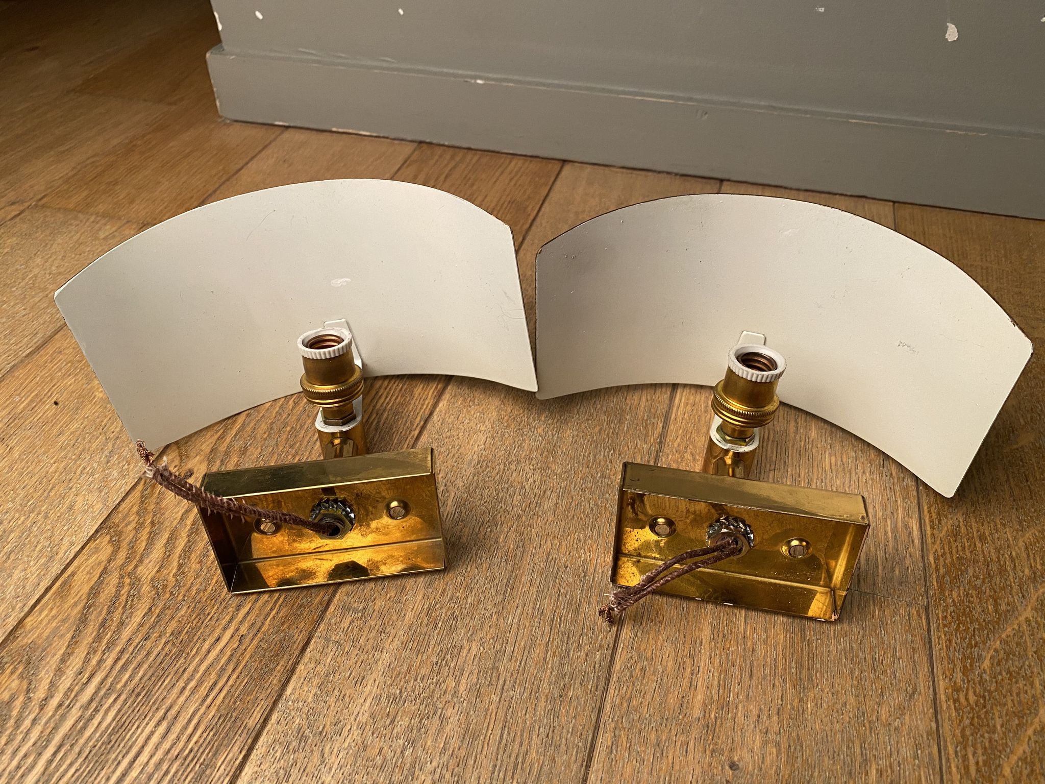 Pair of gilded brass and varnish sconces from SCE circa 1980