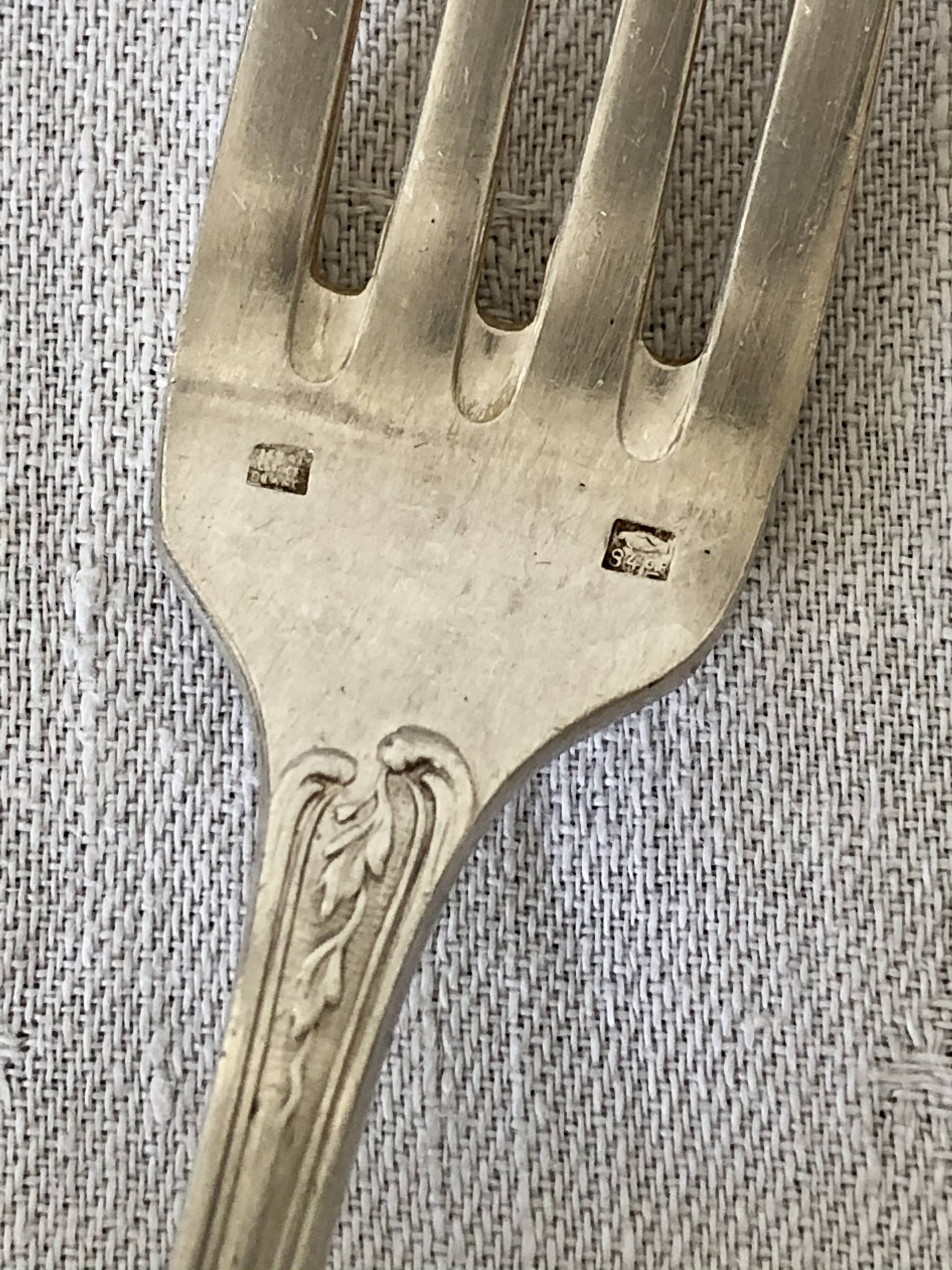 Lot de 4 fourchettes en métal argenté