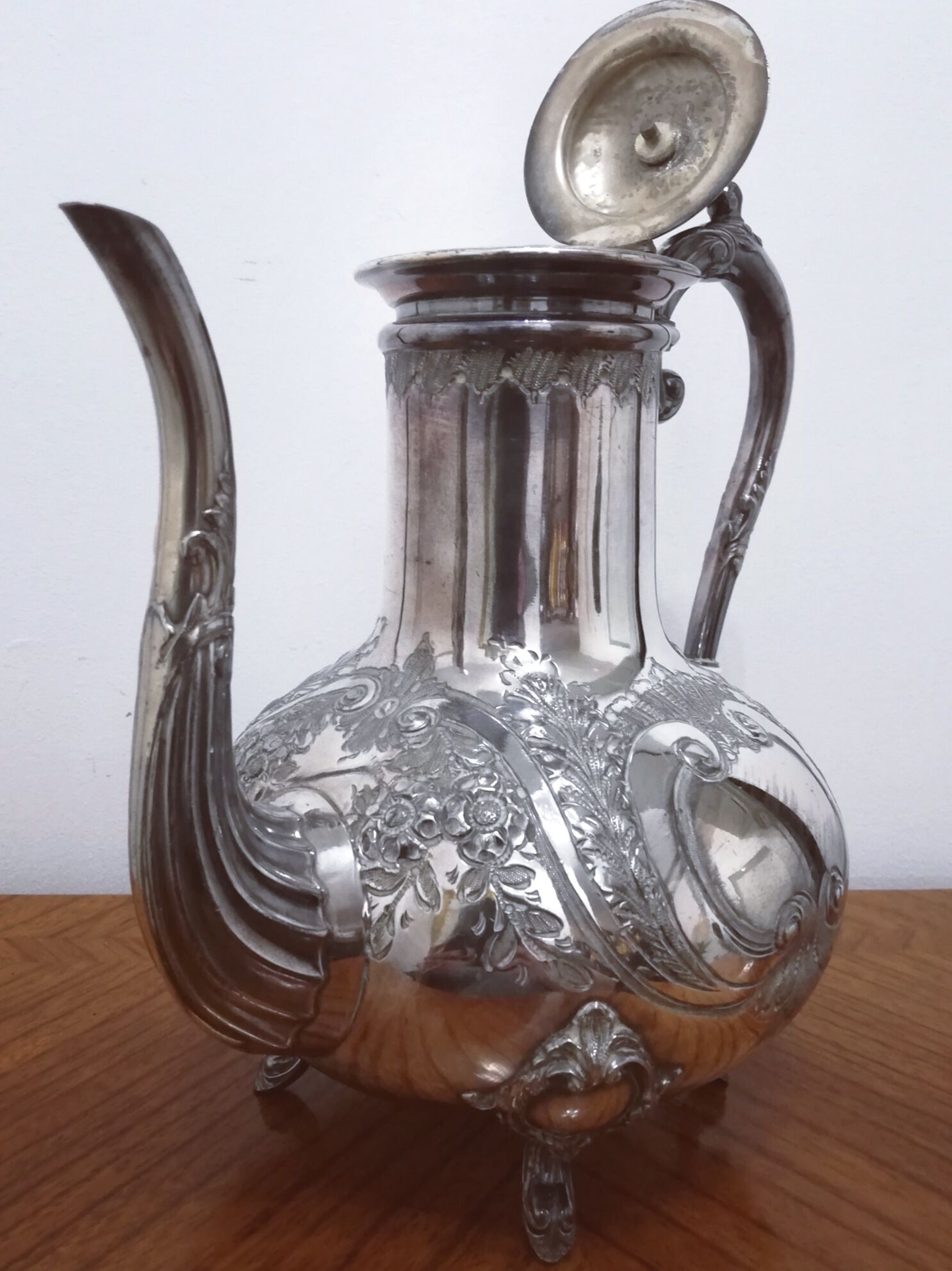 Silver metal teapot in Louis XV style