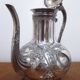 Silver metal teapot in Louis XV style