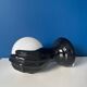 Vintage wall sconce with black hand and white opaline glass globe, 1970s L