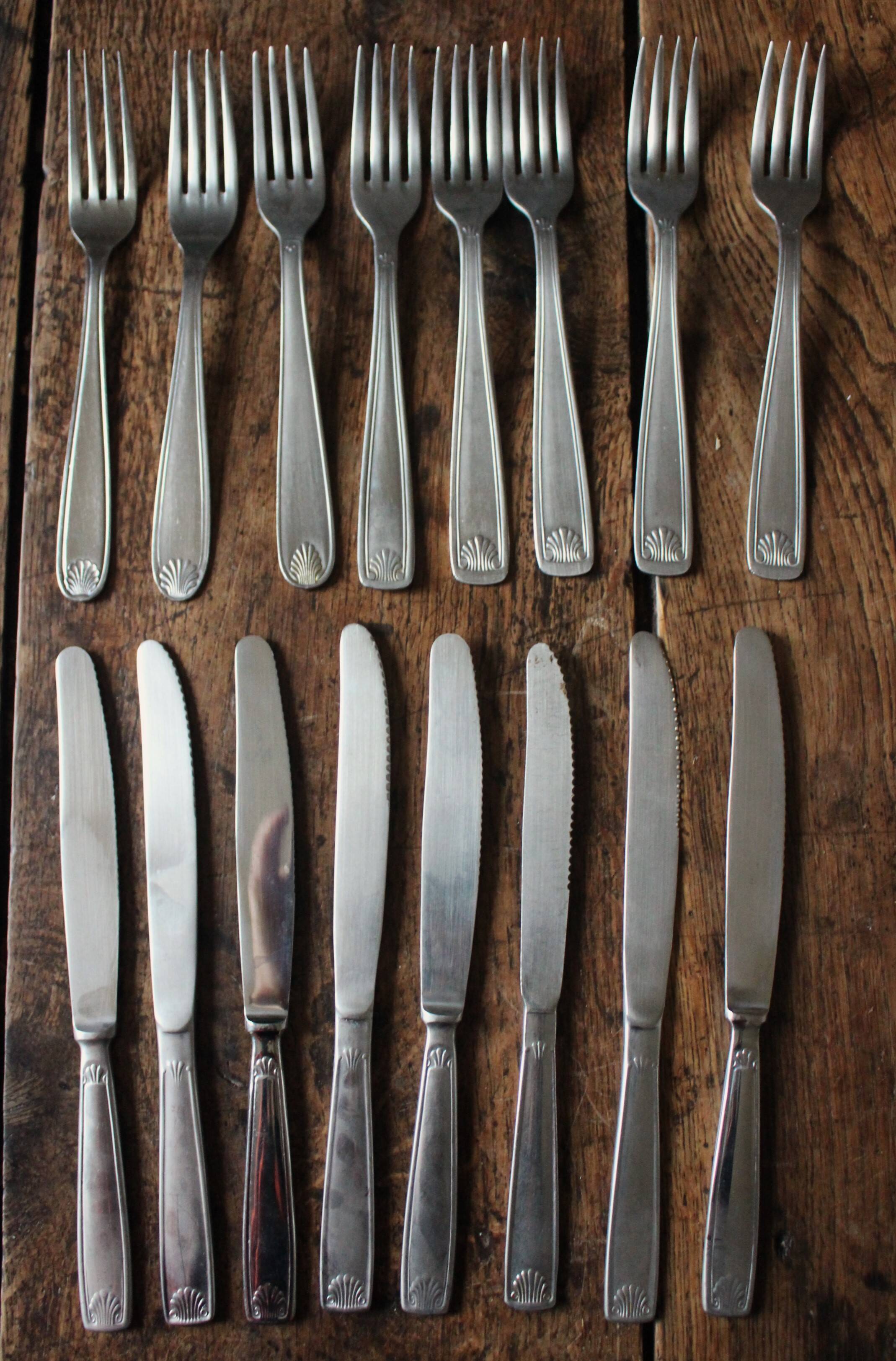 Mismatched set of 8 forks + 8 vintage shell stainless steel knives