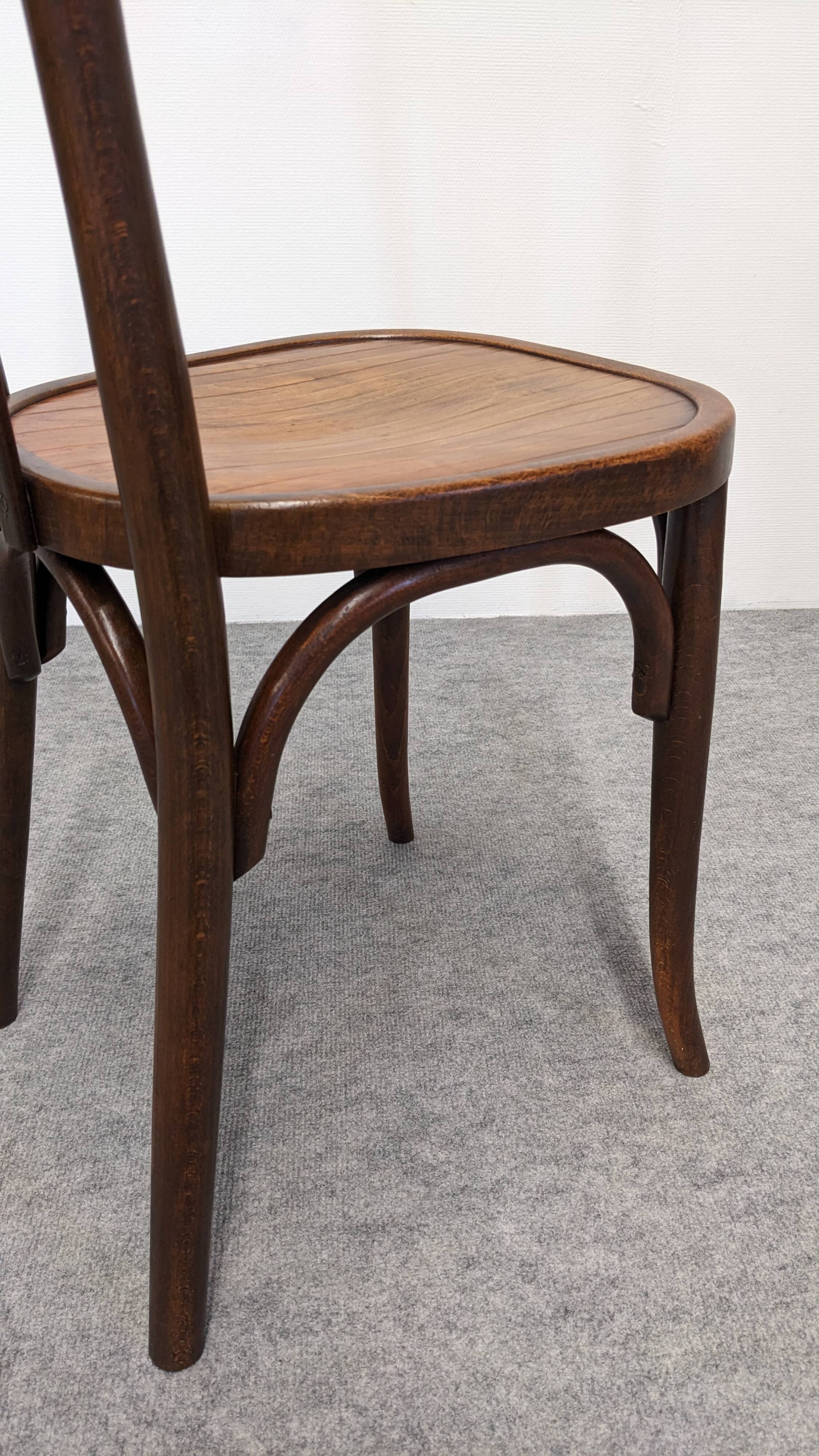 Set of 8 Baumann bistro chairs in bent beech, France circa 1930.