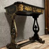 Lacquered work table, blackened wood decorated with Chinese scenes, Napoleon III period circa 1850