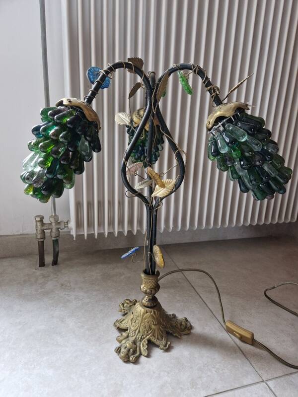 Bronze table lamp and Murano glass grape clusters.