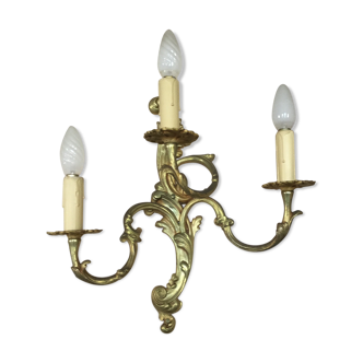 Louis XV-style wall light in solid bronze