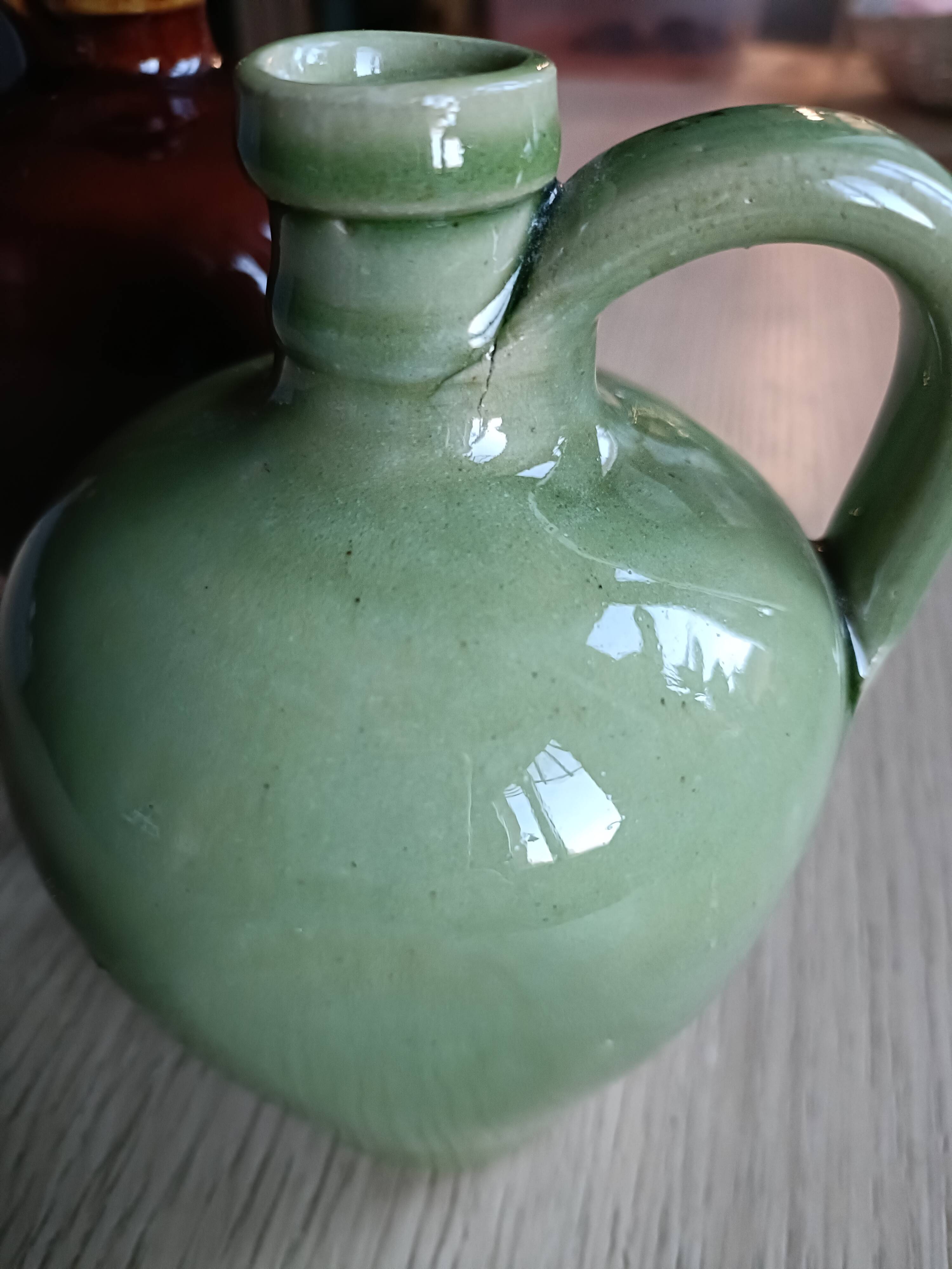 2 small glazed stoneware bottles