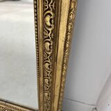 Louis XVI style mirror in wood and gilded stucco, 19th century