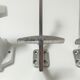 Four porcelain and vintage aluminum hooks