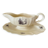 Antique sauce boat in Sarreguemines earthenware.