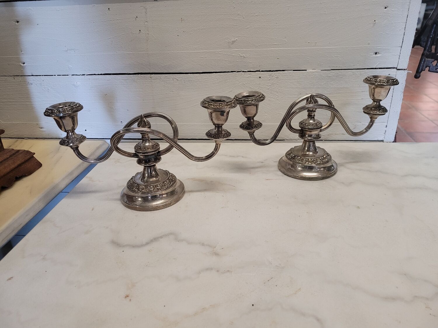 Pair of silver metal candlesticks