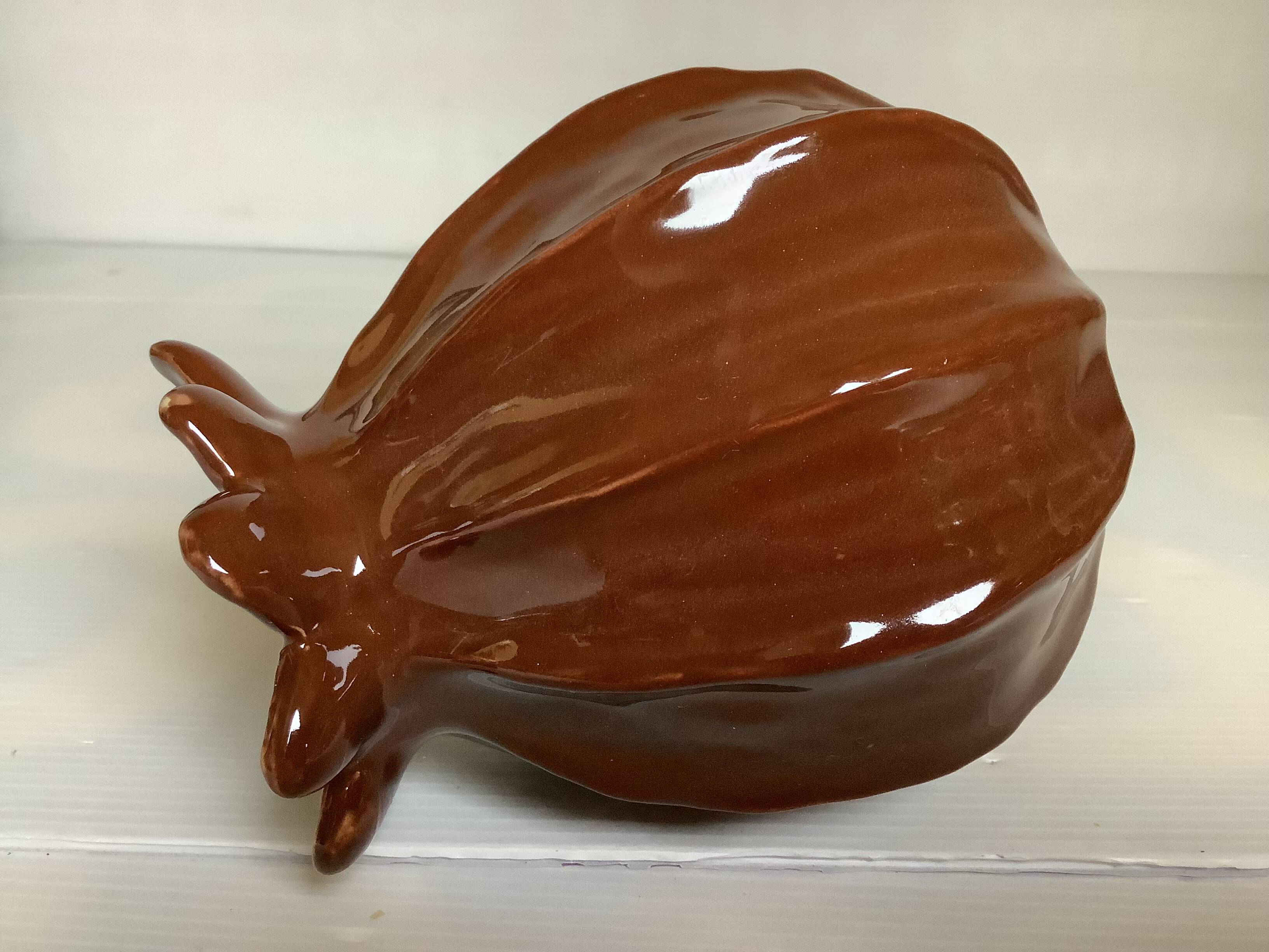 Brown ceramic corolla vase