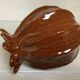 Brown ceramic corolla vase