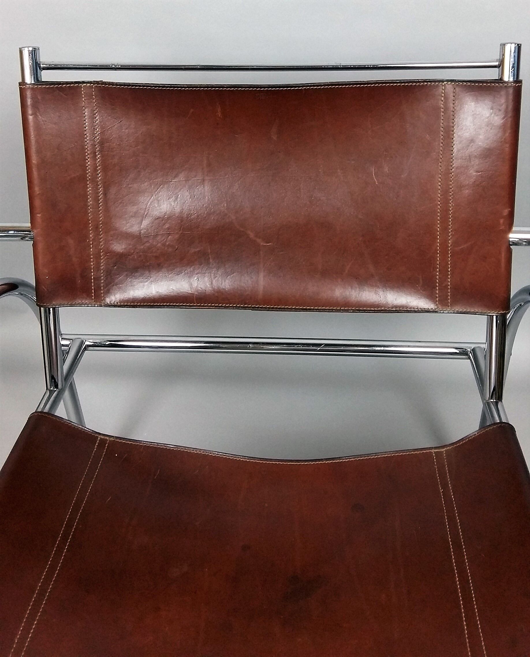 Pair of armchairs chromed metal and leather, 60 years