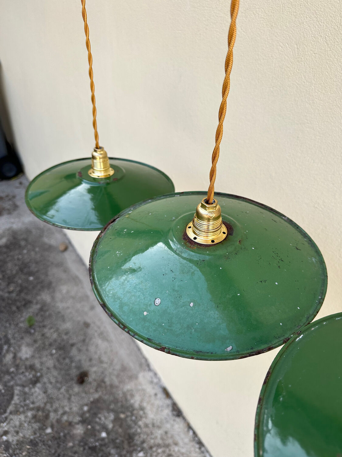 Trio of vintage pendant lights in green and white enameled sheet metal, industrial farmhouse decor