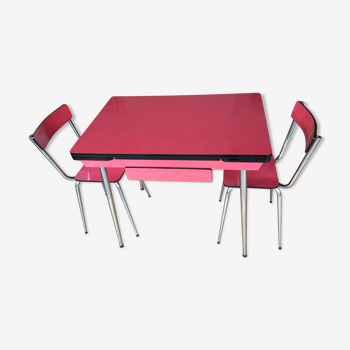 Table set and 2 vintage vintage pale red formica chairs