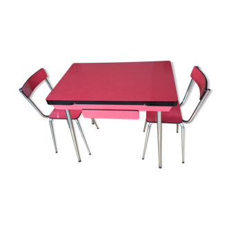 Table set and 2 vintage vintage pale red formica chairs