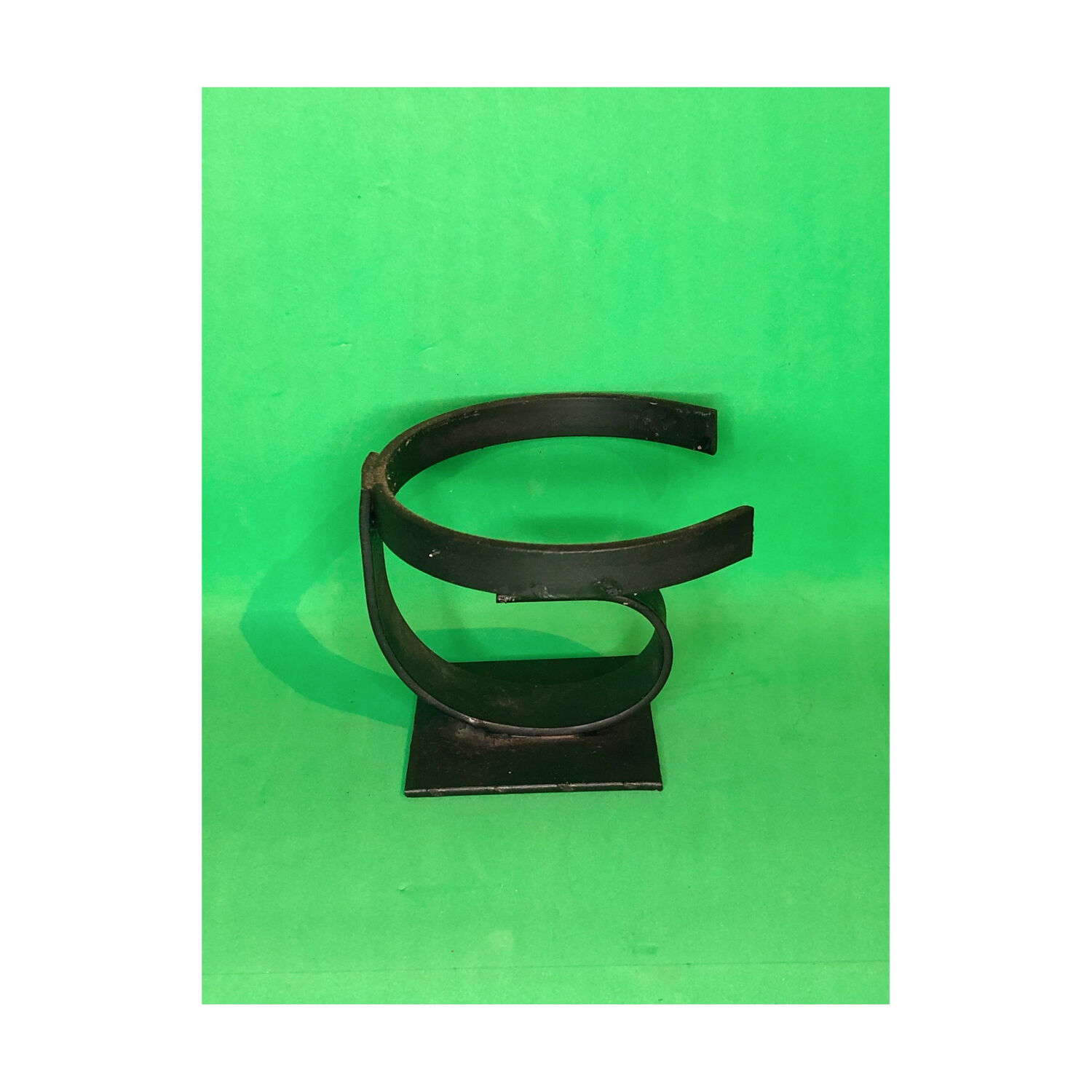 Flat iron candle holder