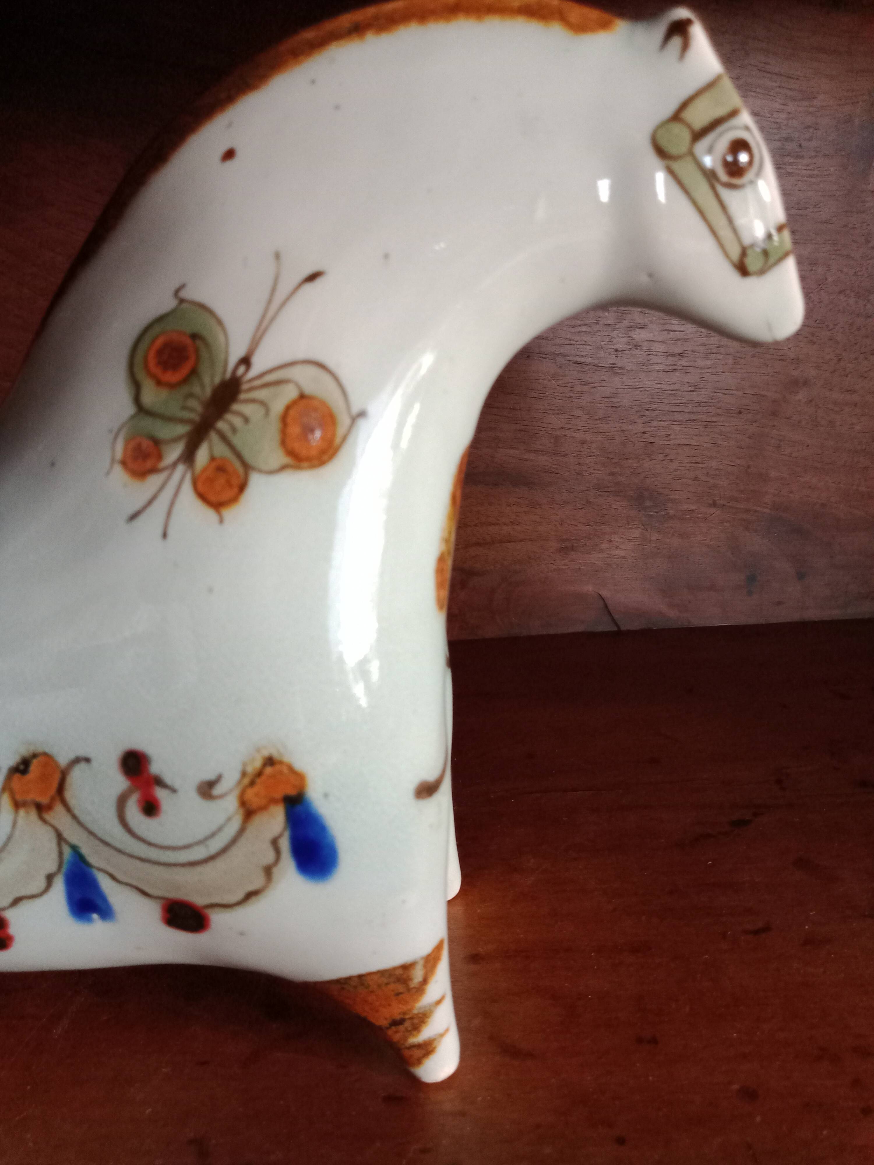 Ken edwards pottery - stylized horse decorated with butterfly flowers bird