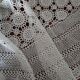 Old crocheted round tablecloth