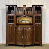Art Nouveau mahogany buffet with clock in the style of G. Serrurier Bovy.