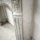 Louis XV style fireplace in veined white marble, 20th century.