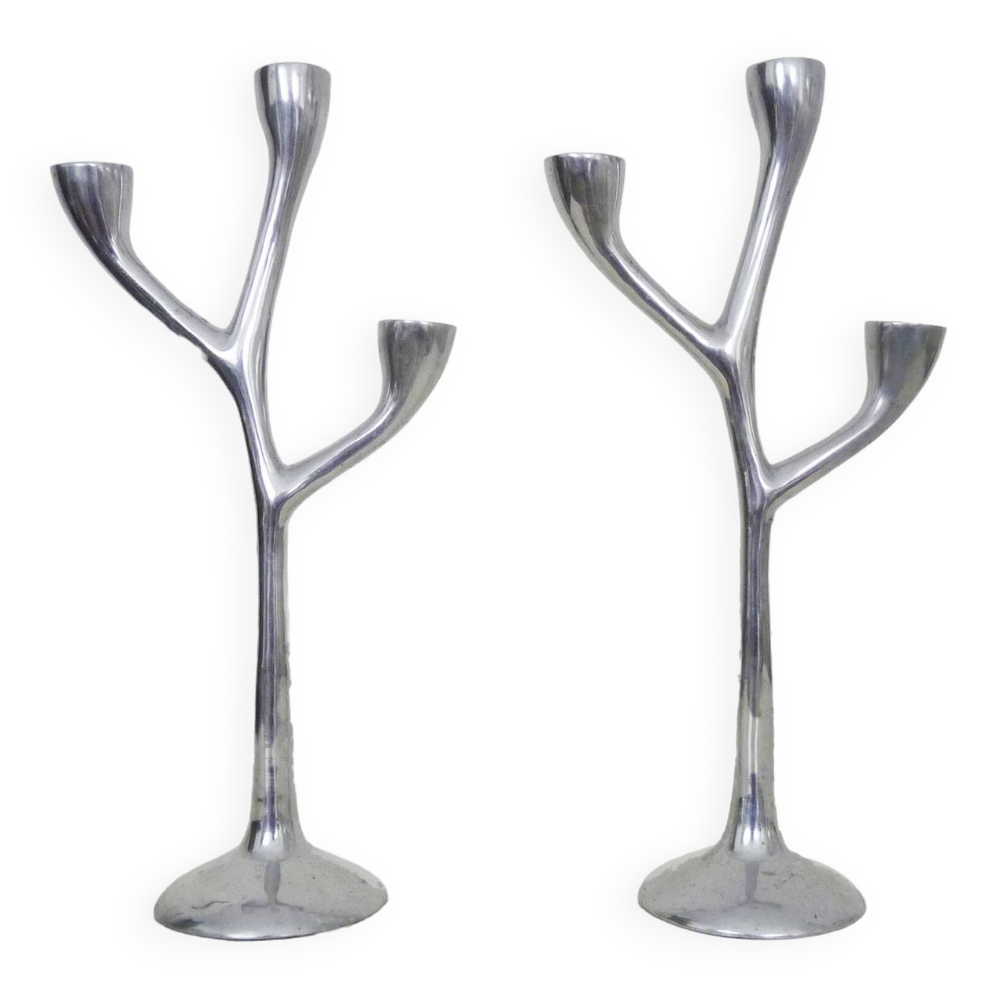 Pair of Italian "Tree" candlesticks in cast aluminum from the 80s