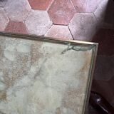 Brass coffee table with shaded lacquer top