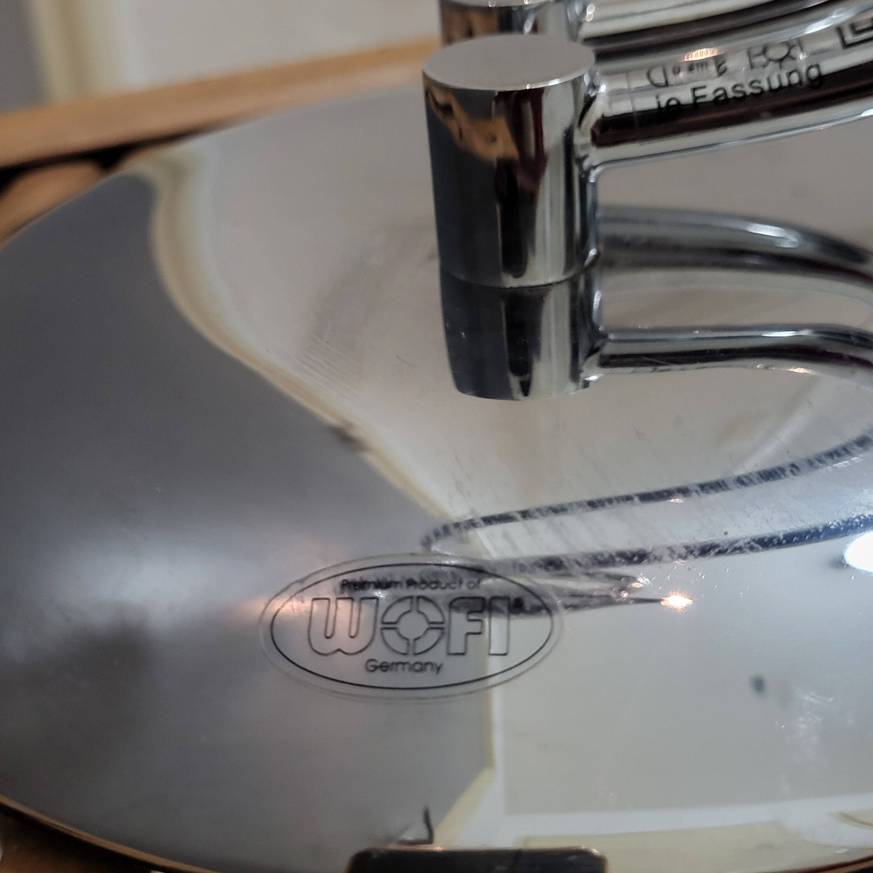Sculptural design table lamp in chrome metal, Wofi Leuchten, Germany.
