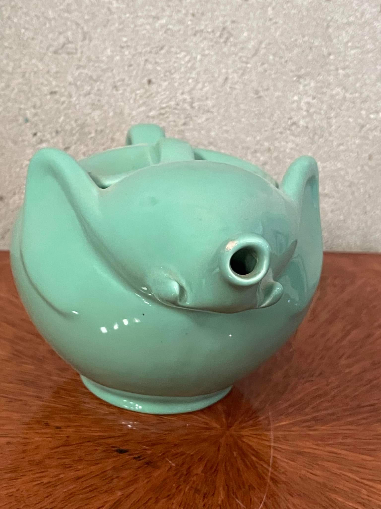 Green vintage elephant teapot