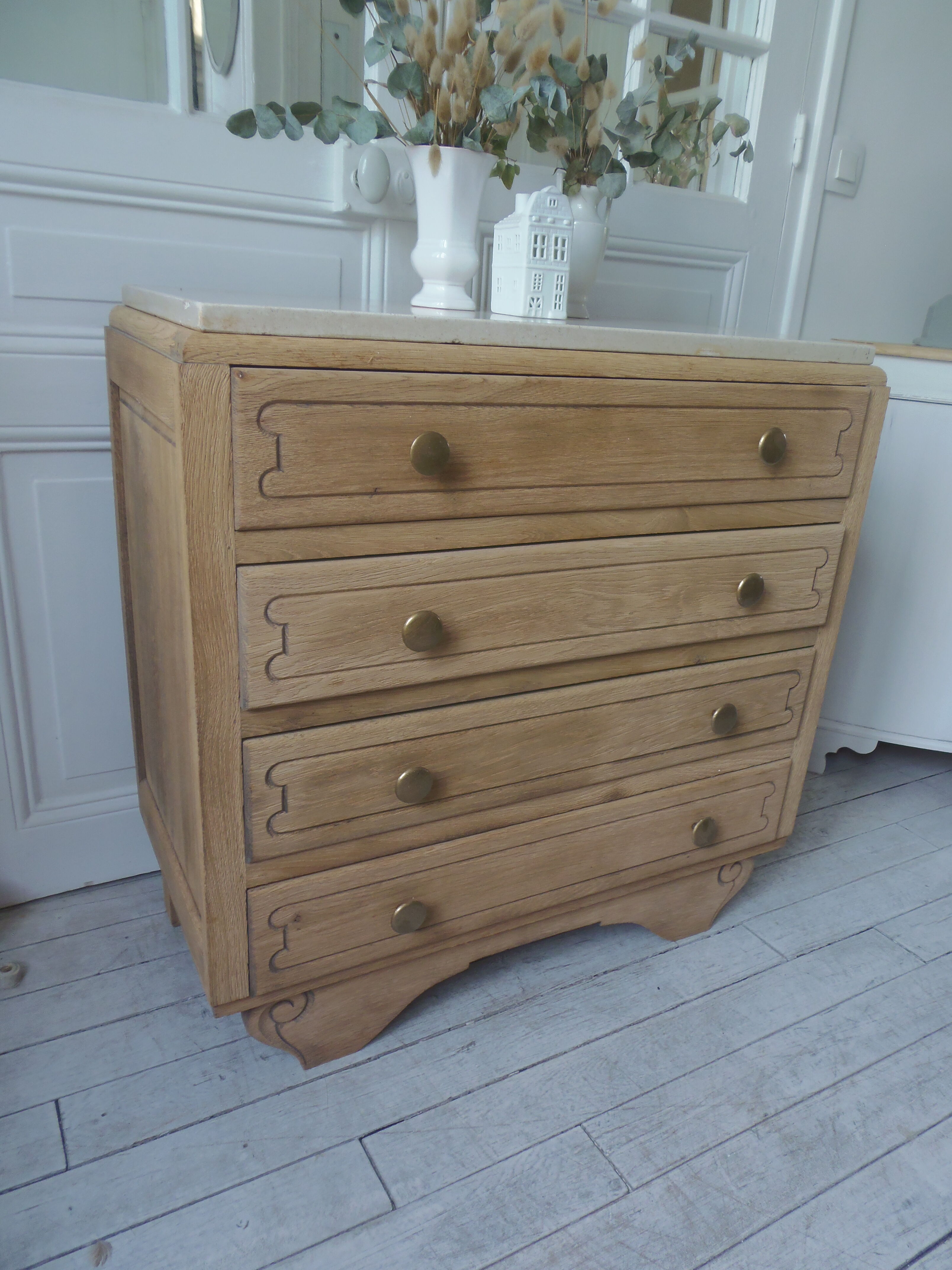 Vintage oak chest of drawers, a travertine plate laid for tray.