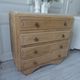 Vintage oak chest of drawers, a travertine plate laid for tray.