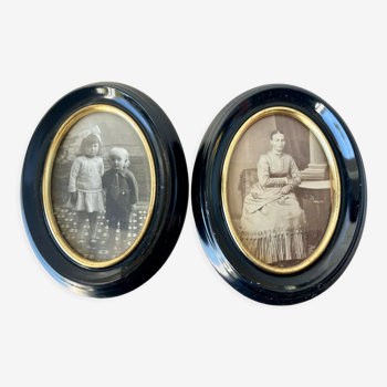 Pair of black wooden oval frames 1880’s  each 13 cm x 10 cm glass measurements 8.5 cm x 5.5 cm