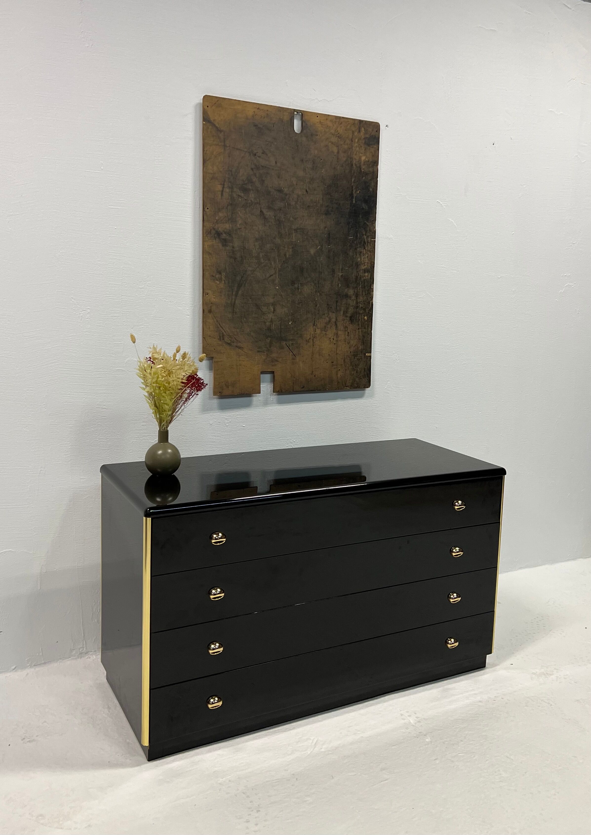 Black lacquered chest of drawers