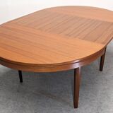 Scandinavian round extendable teak table, 60s-70s