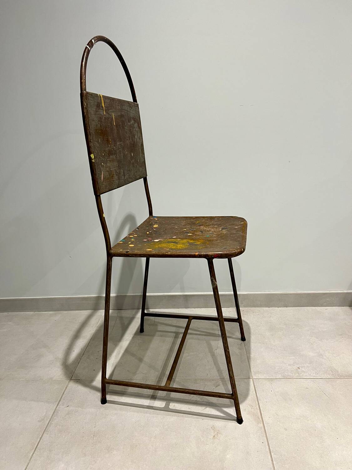 Pair of vintage raw metal chairs