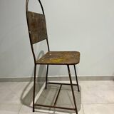 Pair of vintage raw metal chairs