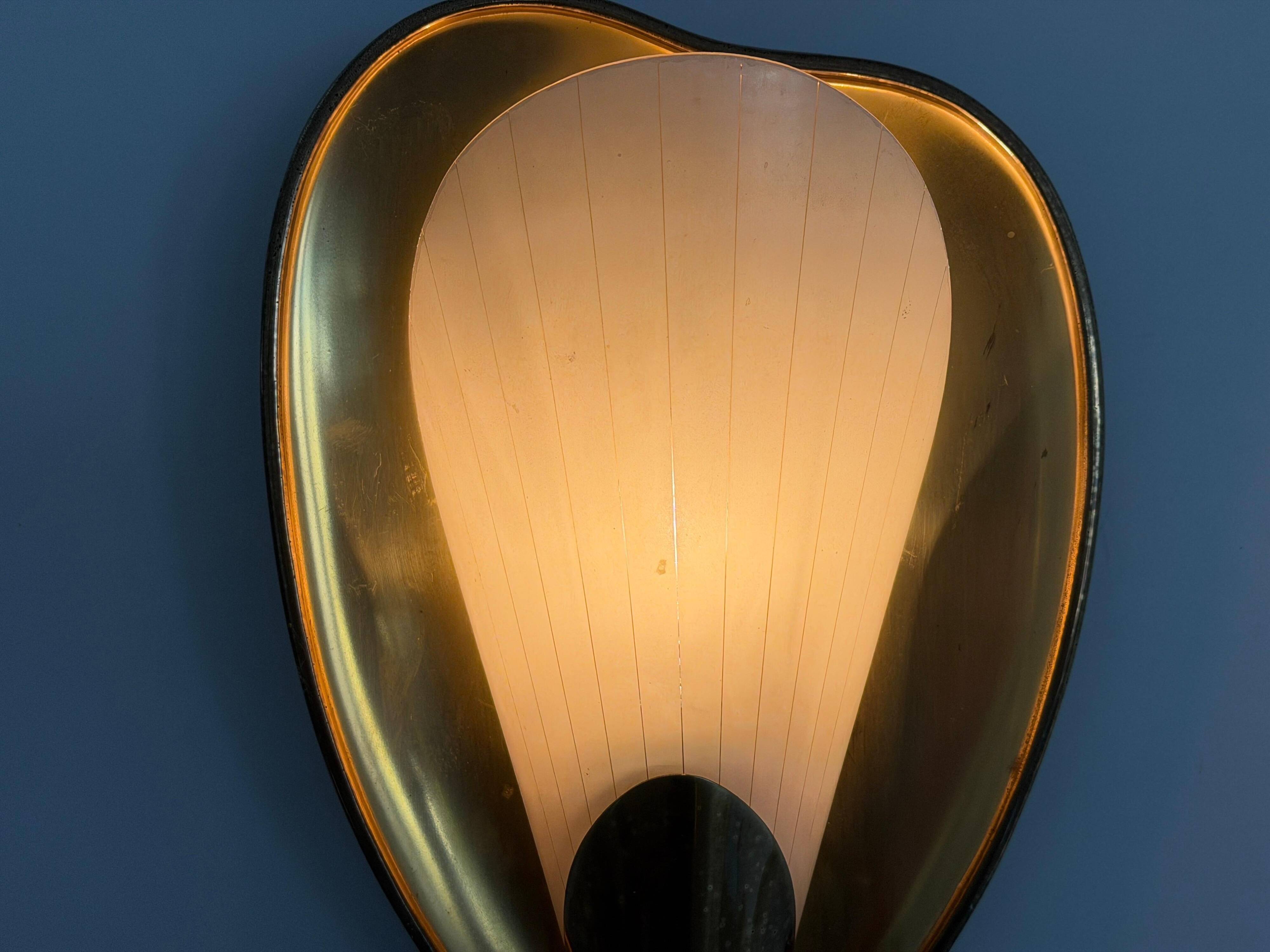 Pair of brass and glass wall lights from the mid-century, 1950s, Germany.