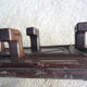 Wall-mounted coat rack in solid oak with 9 hooks.